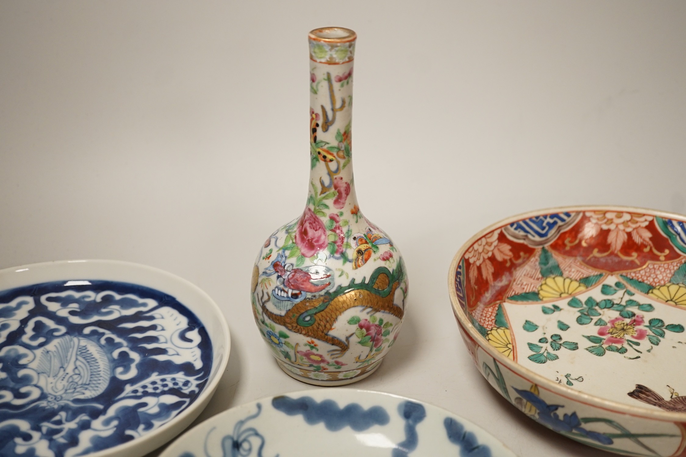 A Chinese famille rose bottle vase, 17cm tall, together with a group of oriental porcelain